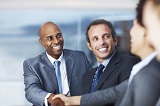 160-African-American-business-man-greeting-a-colleague-during-a-meeting.jpg